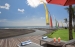 Sun Chairs By River To Beach
